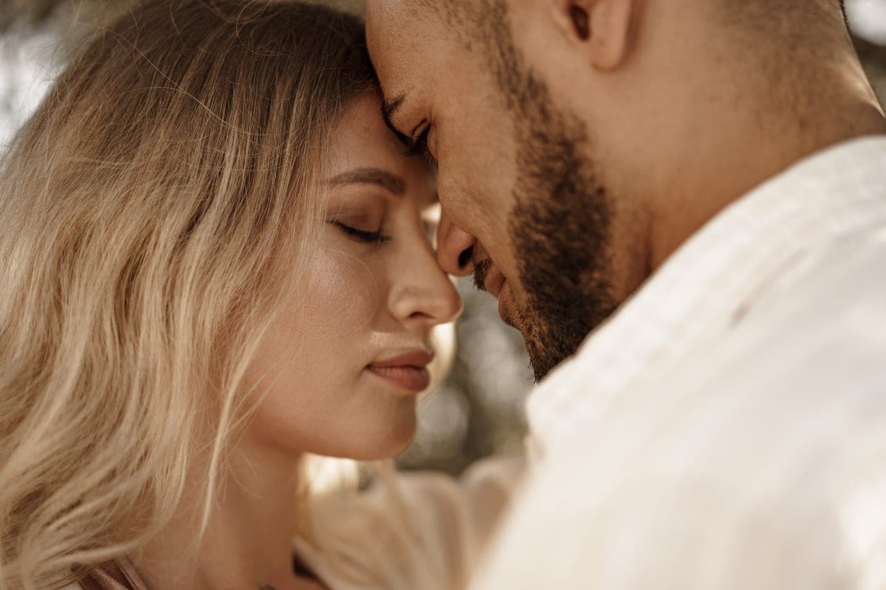 A couple embracing on their wedding day